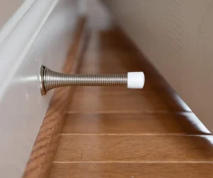 Baseboard-Spring-Door-Stop_1024x1024